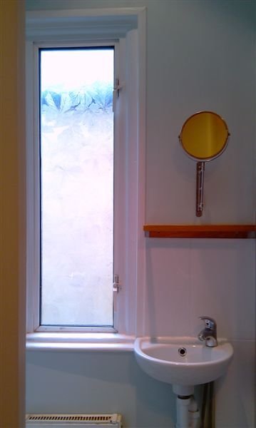 bathroompaintingwallswoodworkfittedshelfandmirror.jpg