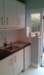 fittedkitchenunitssinkworktoptilingpaintingwallswoodwork_small.jpg