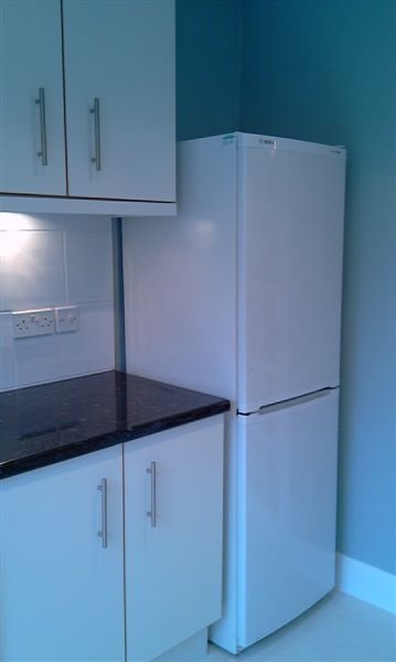 fittedkitchenunitsworktoptilingpaintingwallswoodwork.jpg