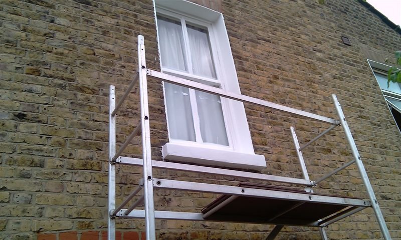 repairandpaintsandstonewindowcill.jpg